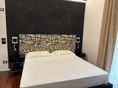 Letto o letti in una camera di Noto Boutique Hotel