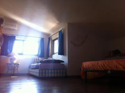 Letto o letti in una camera di Villagiò