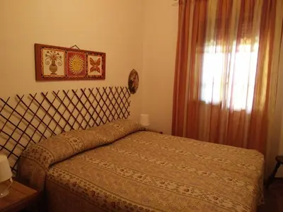 Letto o letti in una camera di Mamma Arancia