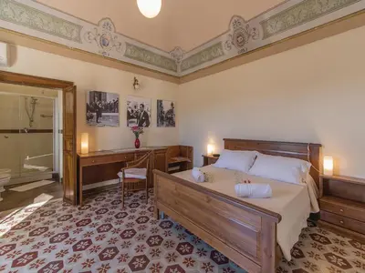 Letto o letti in una camera di Baglio Fasana whole property
