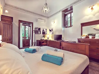 Letto o letti in una camera di Baglio Fasana whole property