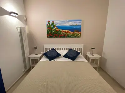 Letto o letti in una camera di Casa Della Pittura