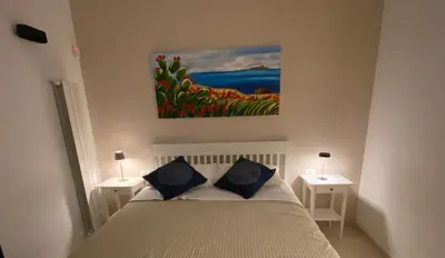 Letto o letti in una camera di Casa Della Pittura