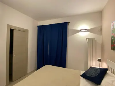 Letto o letti in una camera di Casa Della Pittura