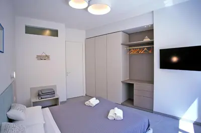 Letto o letti in una camera di Mandolino Apartment