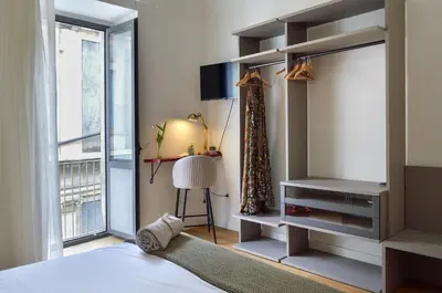 Letto o letti in una camera di Le Leggende di Casa Università