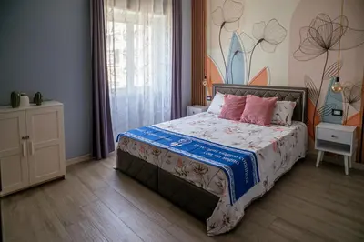 Letto o letti in una camera di Catania, centro, Sicilia, Italia, Grandi Sogni Home Appartamento