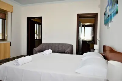 Letto o letti in una camera di Villa con piscina in Santa Maria del Focallo