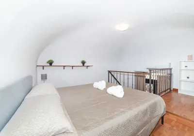 Letto o letti in una camera di Il loft di Serena