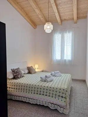 Letto o letti in una camera di Blu Home
