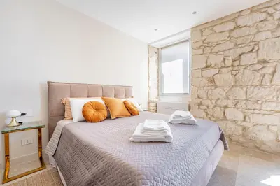 Letto o letti in una camera di Circe Sul Mare