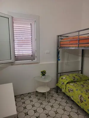 Letto o letti in una camera di Villa Stella