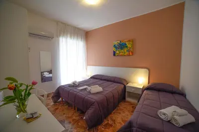 Letto o letti in una camera di B&B Siracusa Holidays