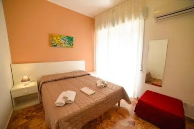 Letto o letti in una camera di B&B Siracusa Holidays