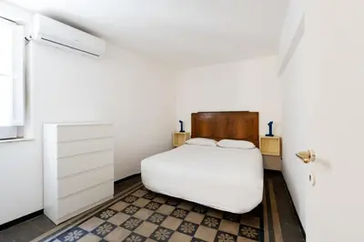 Letto o letti in una camera di Casa Jolanda