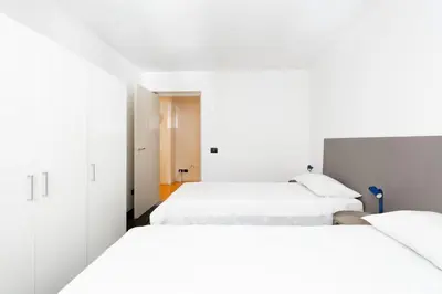 Letto o letti in una camera di Casa Jolanda