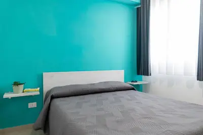 Letto o letti in una camera di GuestHost - Borgo 84 Marzamemi - Cuore Blu Flat