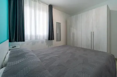 Letto o letti in una camera di GuestHost - Borgo 84 Marzamemi - Cuore Blu Flat