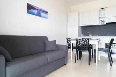 Area soggiorno di GuestHost - Borgo 84 Marzamemi - Cuore Blu Flat