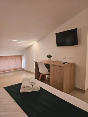 TV o dispositivi per l'intrattenimento presso Aura B&B