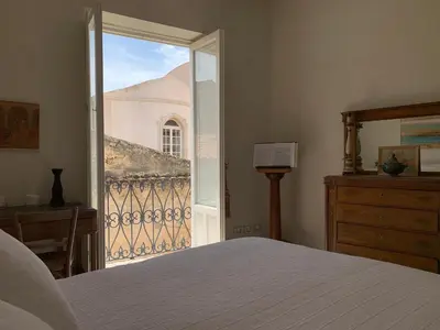 Letto o letti in una camera di Terrazza Cavalieri di Malta by Ortigiapartments