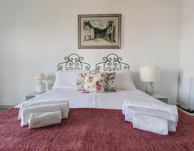 Letto o letti in una camera di Casa del Mandorlo