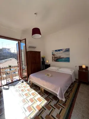 Letto o letti in una camera di Vista Ortigia