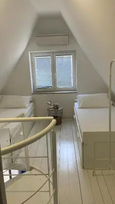 Letto o letti in una camera di Villa Tepee