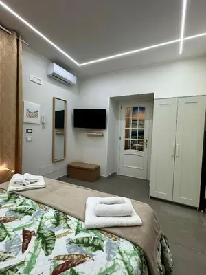TV o dispositivi per l'intrattenimento presso Spampinato Holiday Apartment