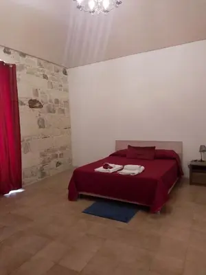 Letto o letti in una camera di Casa vacanze CARTIA