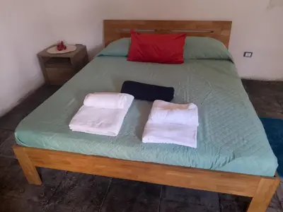 Letto o letti in una camera di Casa vacanze CARTIA