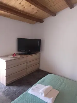 TV o dispositivi per l'intrattenimento presso Casa vacanze CARTIA