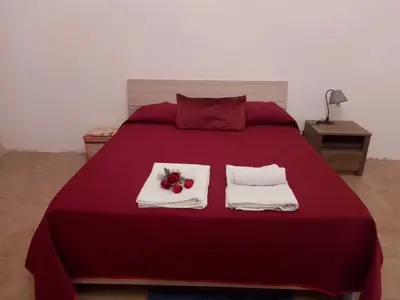 Letto o letti in una camera di Casa vacanze CARTIA
