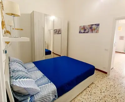 Letto o letti in una camera di Casa Anthea