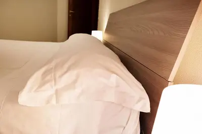 Letto o letti in una camera di Liodoro Catania B&B