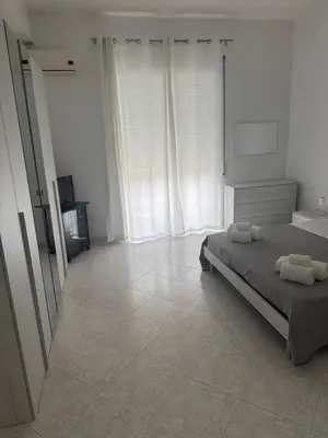Letto o letti in una camera di La residenza di Adamo 2
