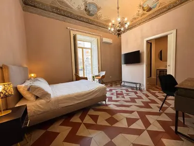 TV o dispositivi per l'intrattenimento presso Dimore del Plebiscito B&B