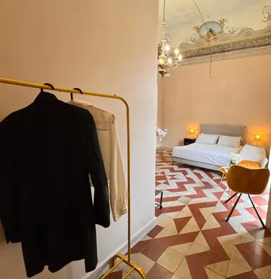 Letto o letti in una camera di Dimore del Plebiscito B&B