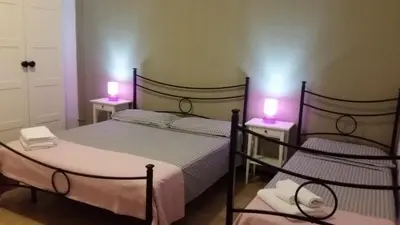 Letto o letti in una camera di B&B Salvatore Lido di Noto