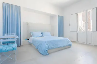 Letto o letti in una camera di Darsena Sunset Suites by Wonderful Italy