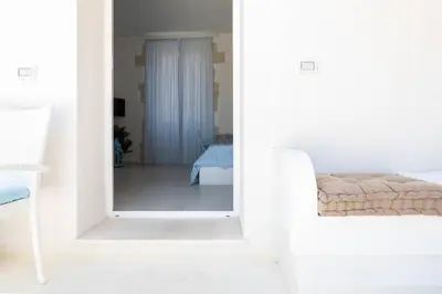 Letto o letti in una camera di Darsena Sunset Suites by Wonderful Italy