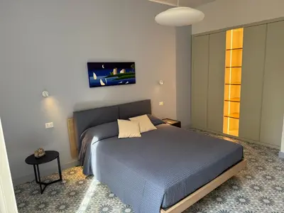 Letto o letti in una camera di Casa delle zie - ZIA ANGELA