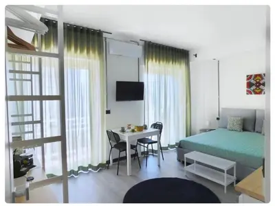 Letto o letti in una camera di La Finestra sul Corso