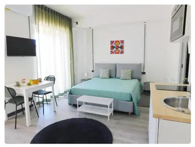 Letto o letti in una camera di La Finestra sul Corso