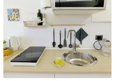 Cucina o angolo cottura di La Finestra sul Corso