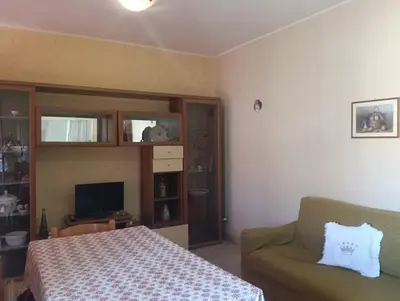 Letto o letti in una camera di casa vacanza luminosa fava