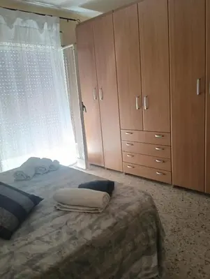 Letto o letti in una camera di casa vacanza luminosa fava