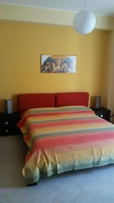 Letto o letti in una camera di Orange House
