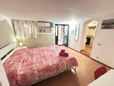 Letto o letti in una camera di Buongiorno Ortigia