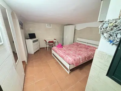 Letto o letti in una camera di Buongiorno Ortigia